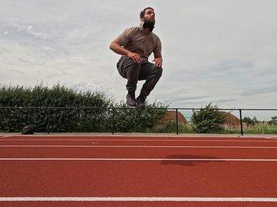 Silhouette of a person doing a jump exercise